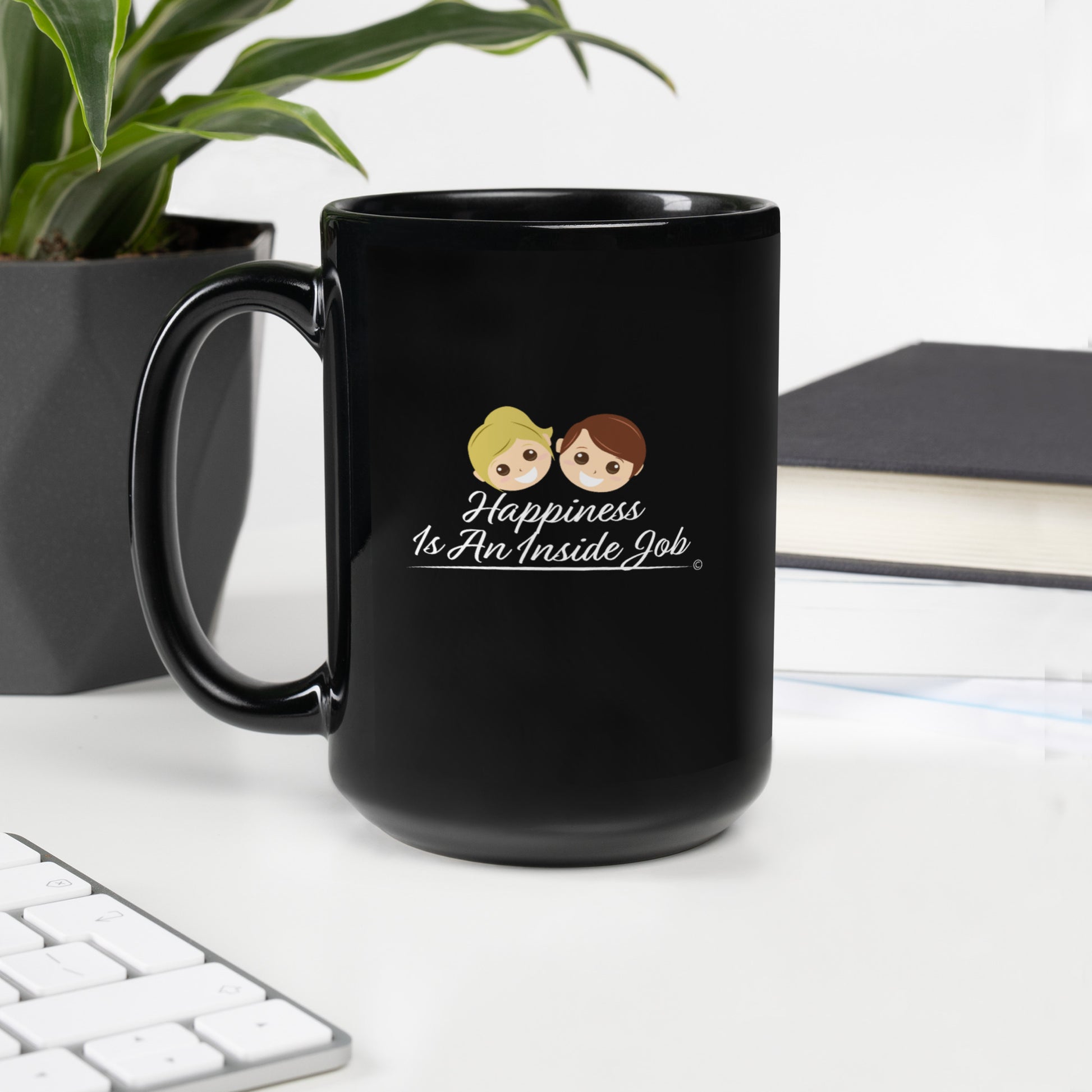 Lustrous black beverage cup with a saying Happiness Is An Inside job