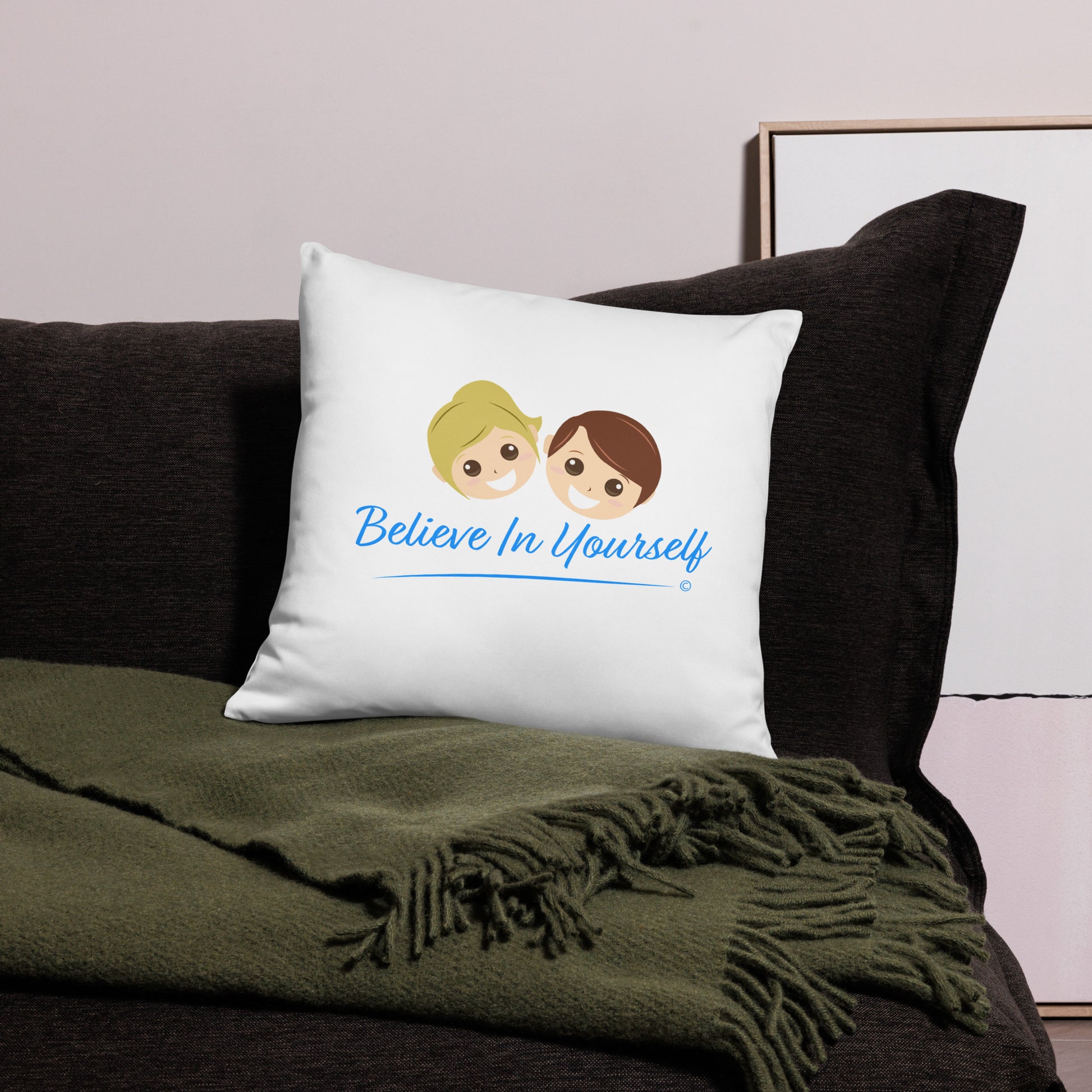 Empowering 18x18 throw pillow with the encouraging message 'Believe in Yourself,' adding a positive touch to a black bed and a vibrant green scarf.
