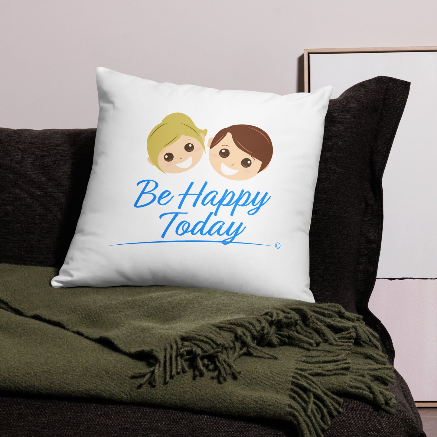 Generously sized 22x22 accent pillow conveying the message 'Be Happy Today,' adding a touch of happiness to a black sofa and a vibrant green scarf.