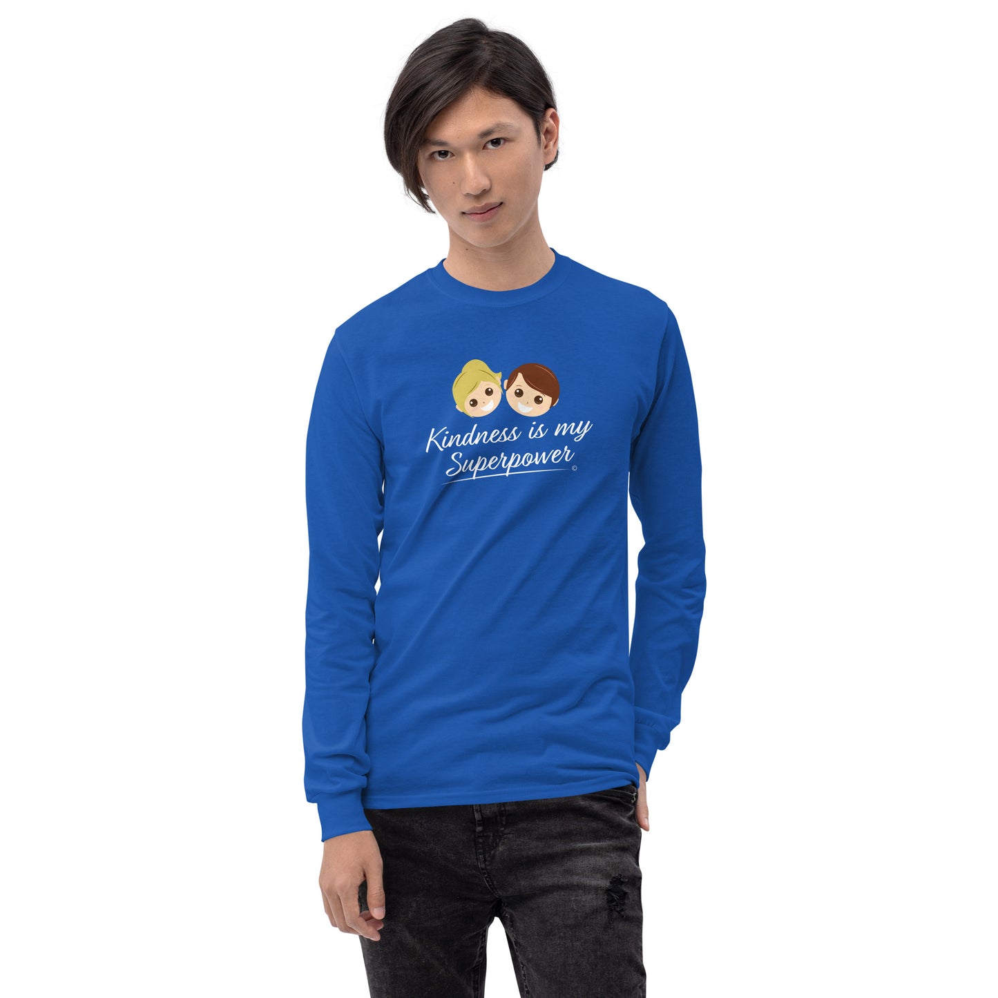A confident young man wearing a stylish long sleeve shirt in royal blue, featuring the empowering quote 'Kindness is my Superpower' in bold lettering.