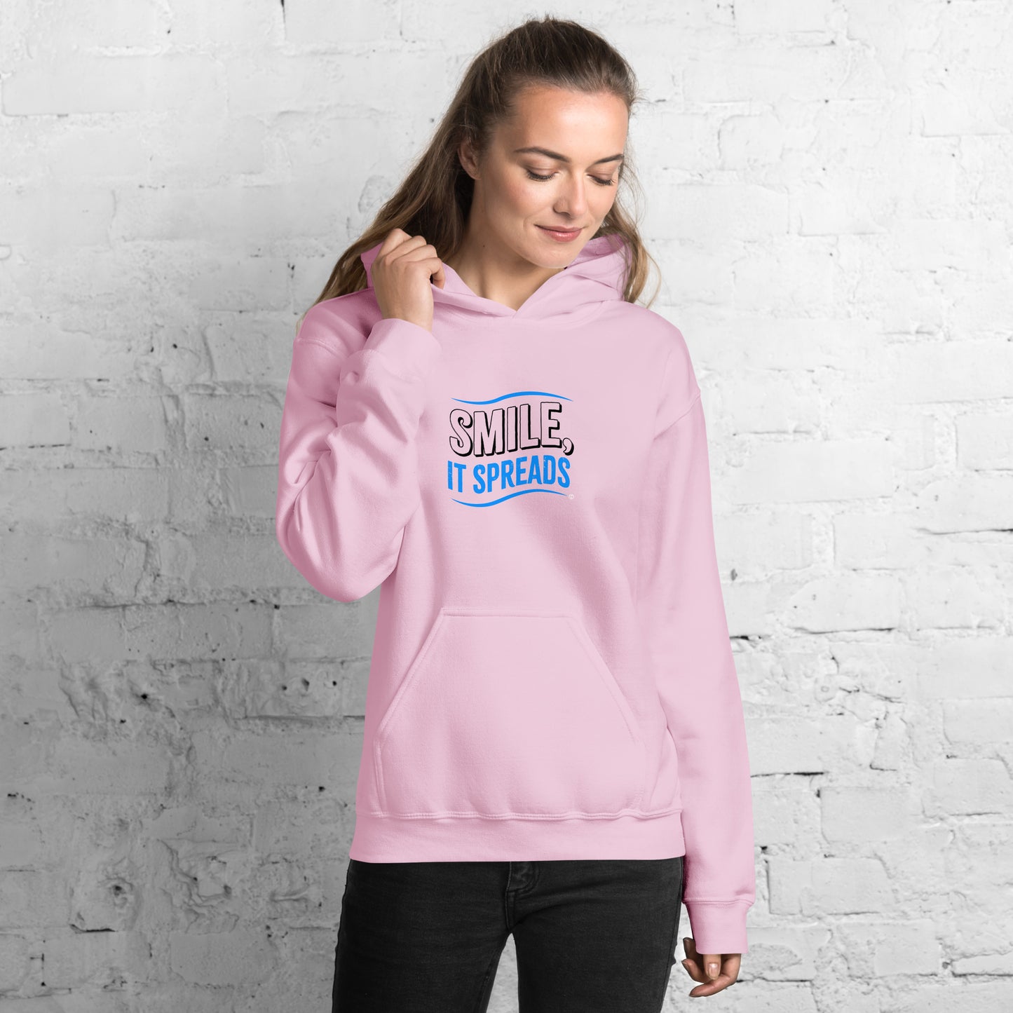 Smile, It Spreads Unisex Hoodies