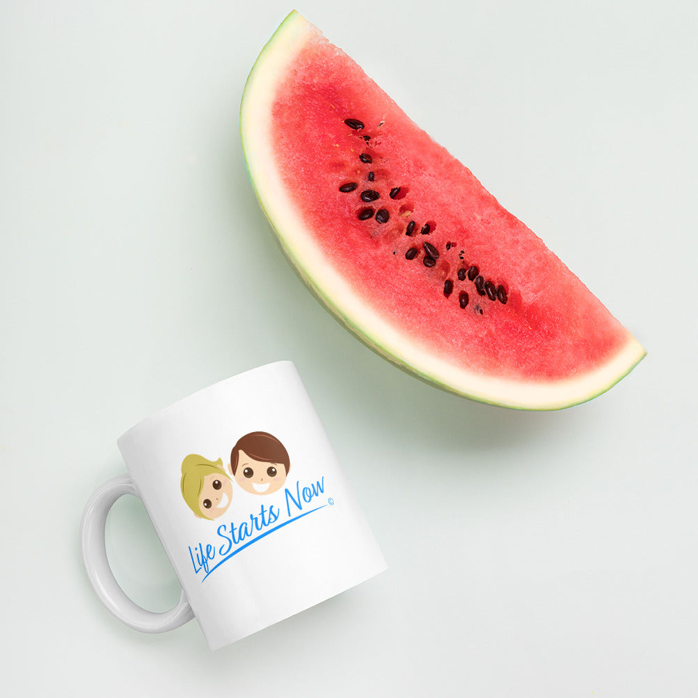 Glossy white latte mug with a watermelon in the background