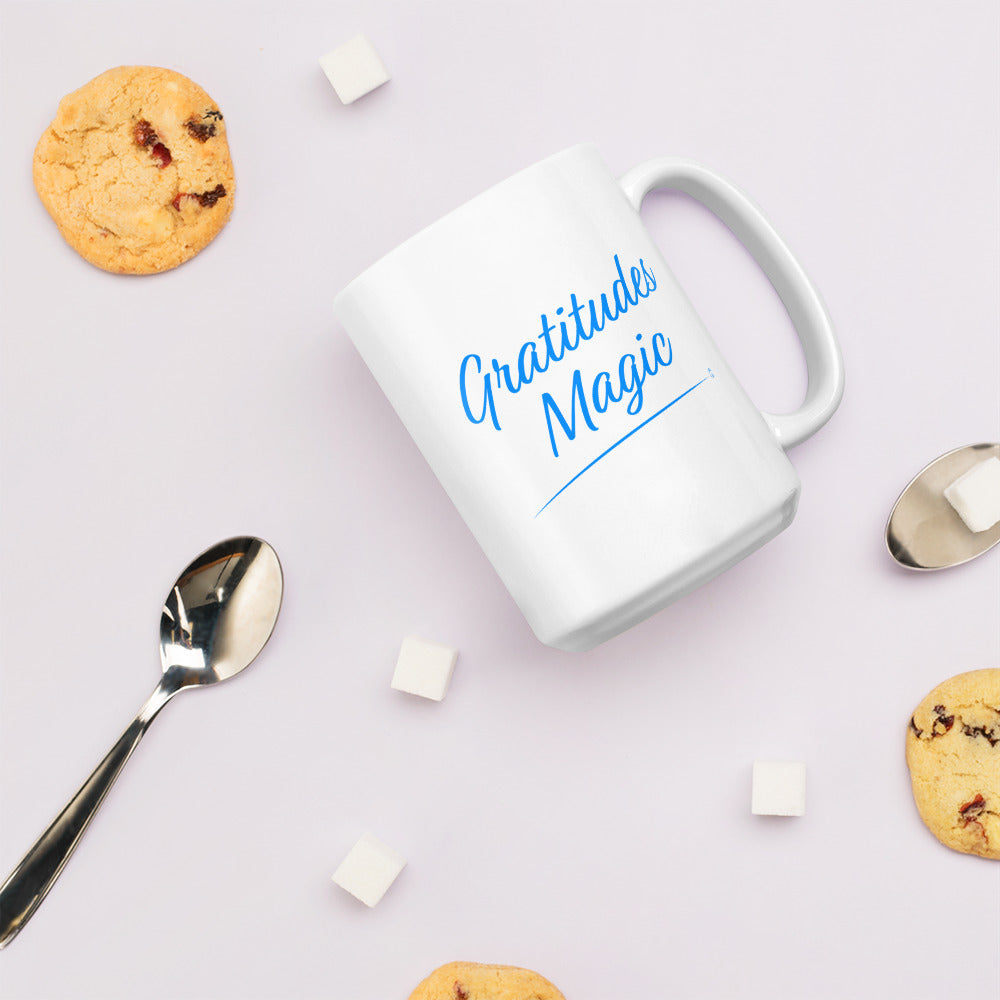 Elegant white ceramic coffee mug with cookies and spoon in the background