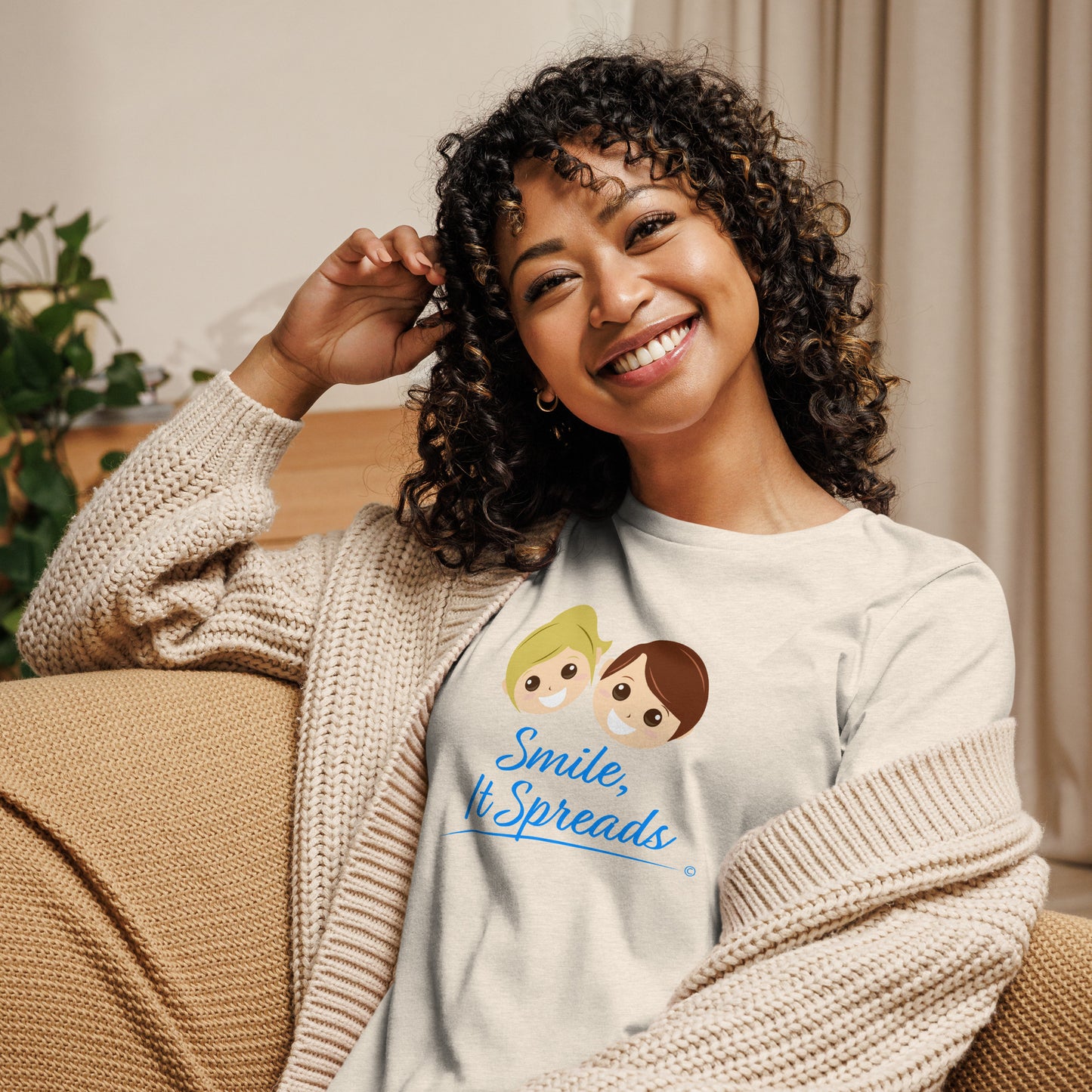 Smile, It Spreads Women's Tees